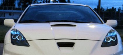 Φανάρια εμπρός angel eyes για Toyota Celica T230 (1999-2005) - μαύρα , με λάμπες (Η1) - σετ 2τμχ. - € 441,9 Φανάρια εμπρός angel eyes για Toyota Celica T230 (1999-2005) - μαύρα , με λάμπες (Η1) - σετ 2τμχ.