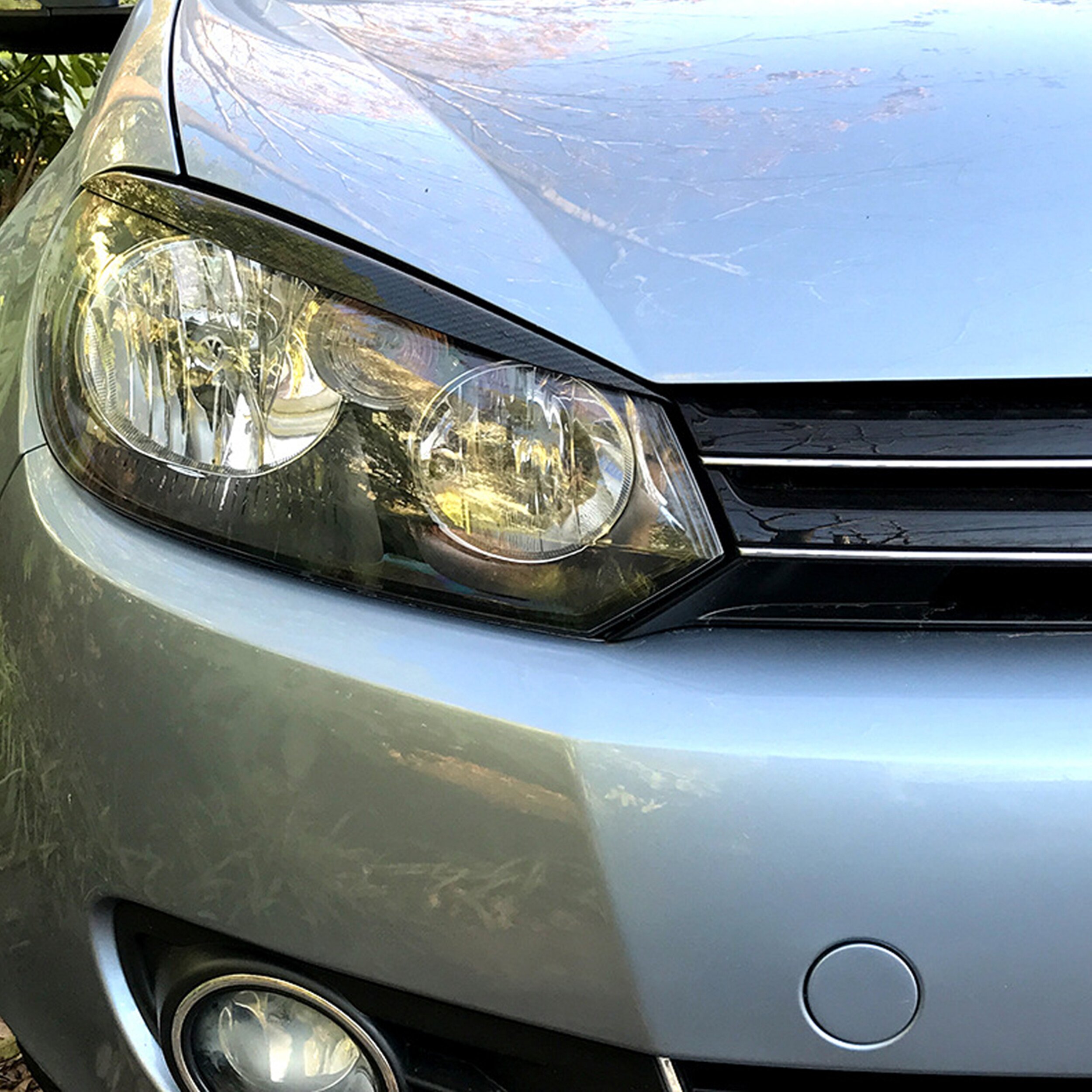 Φρυδάκια φαναριών Vw Golf 6 (2008-2013) - μαύρα γυαλιστερά - € 26,9 Φρυδάκια φαναριών Vw Golf 6 (2008-2013) - μαύρα γυαλιστερά