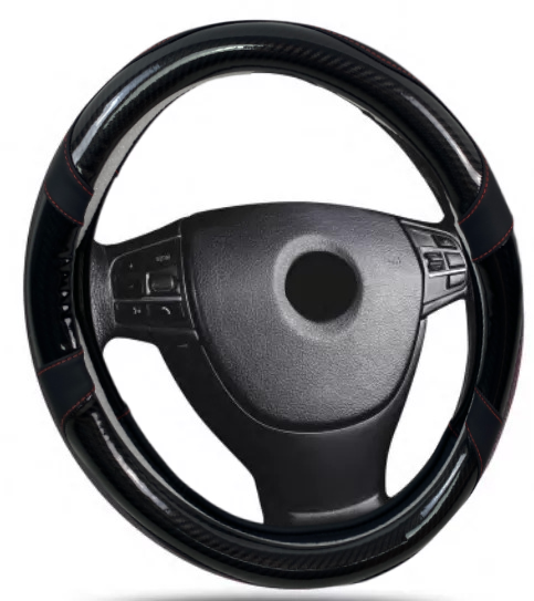Δερμάτινο κάλυμμα τιμονιού 38 cm - Carbon - κόκκινες ραφές - 1 τμχ. - € 26,9 Δερμάτινο κάλυμμα τιμονιού 38 cm - Carbon - κόκκινες ραφές - 1 τμχ.